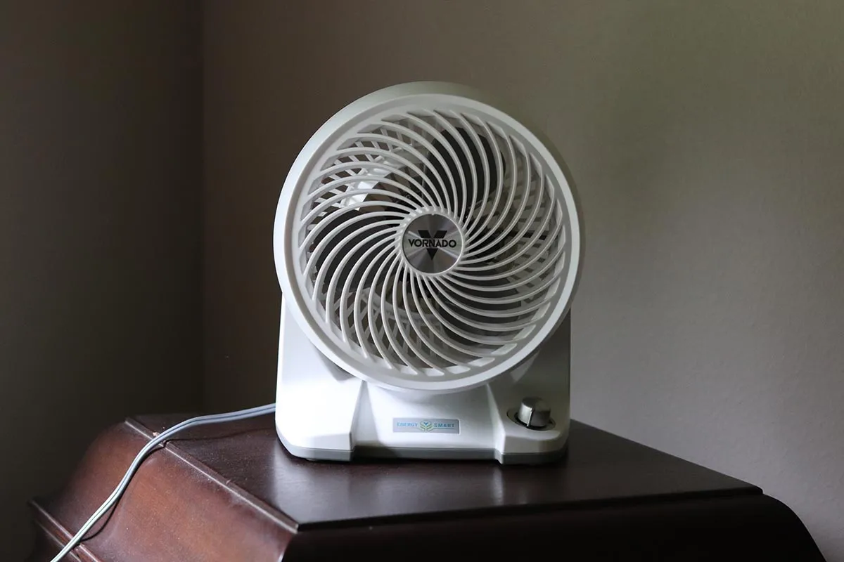 White vornado window fan on table