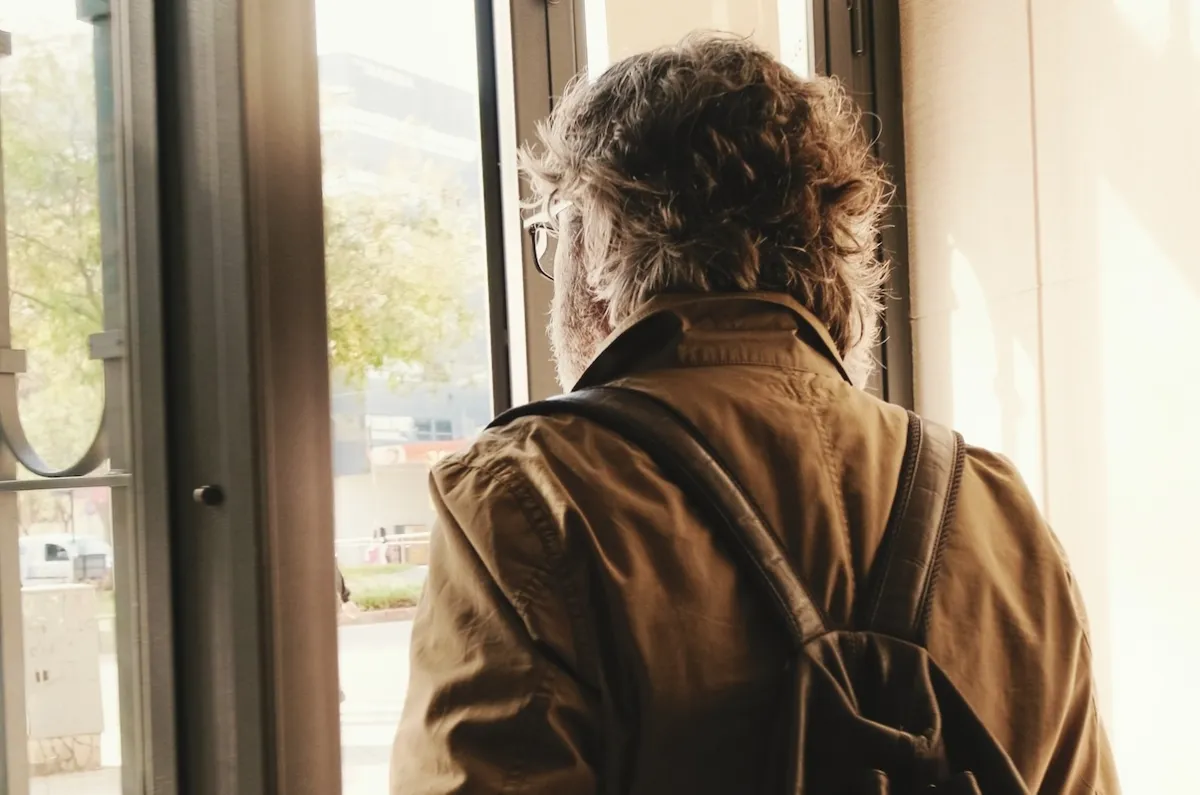 Middle aged man leaving home.