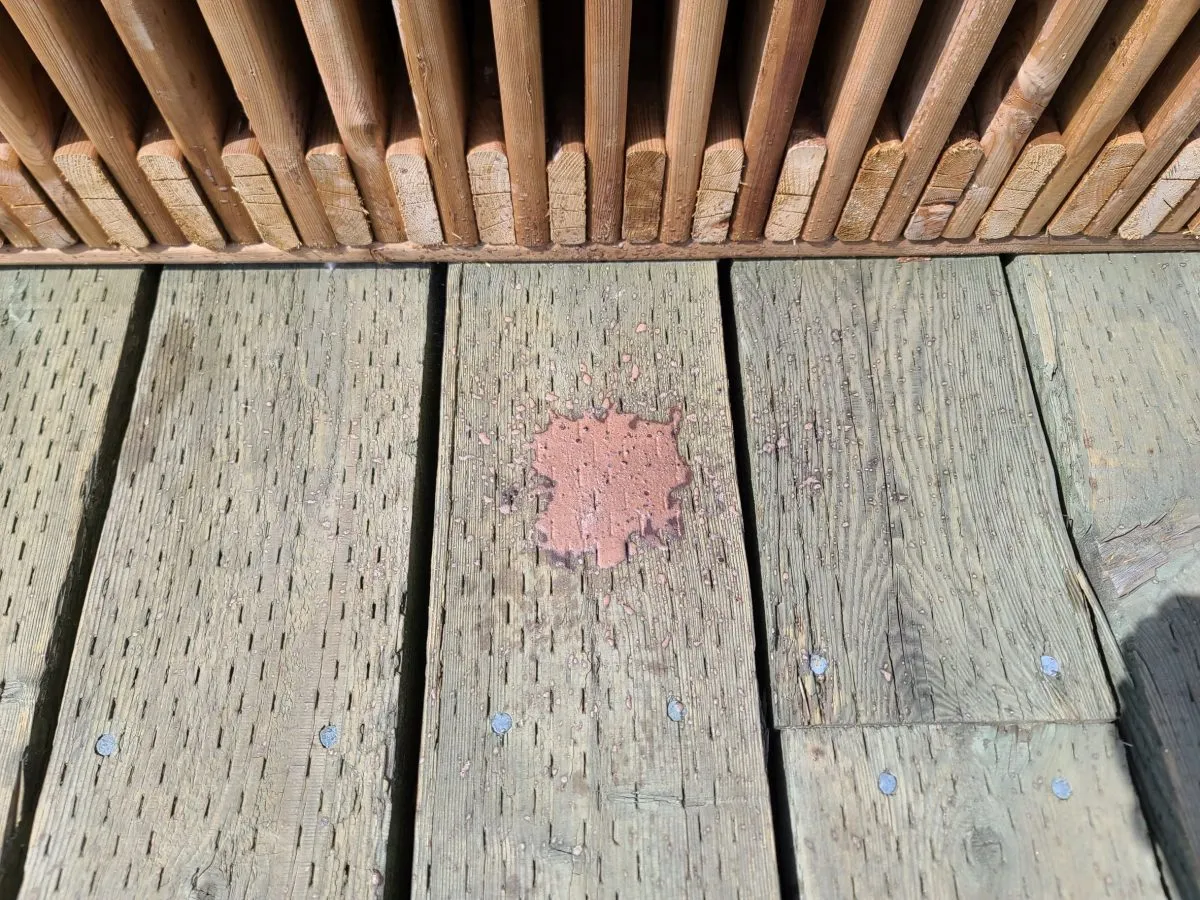 Poorly stained wood deck.