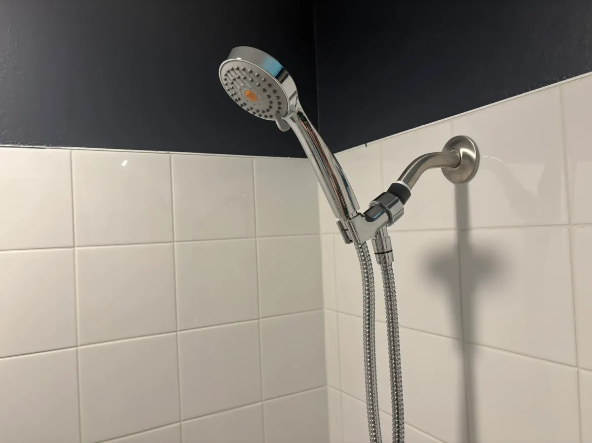 H02ME High-Pressure Handheld Shower Head  in the bathroom as an example of the best shower head for low pressure