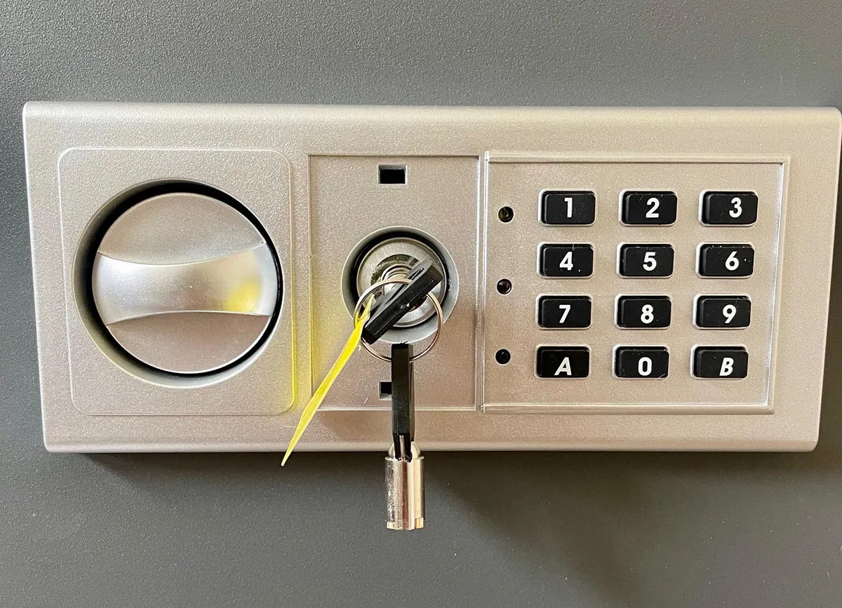 Close up of Paragon wall safe key pad and lock with key inside